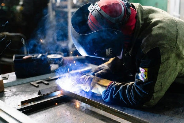 modern cnc machine shop with machinists working